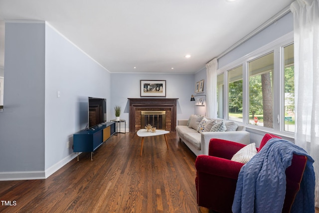 700 Tinkerbell Rd, Chapel Hill, NC 27517 - living area featuring a brick fireplace, crown molding, wood finished floors, and recessed lighting