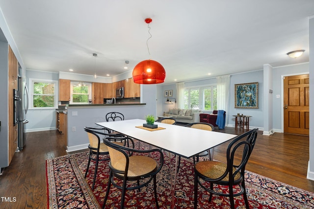 700 Tinkerbell Rd, Chapel Hill, NC 27517 - dining space featuring dark wood-style floors, plenty of natural light, recessed lighting, and ornamental molding