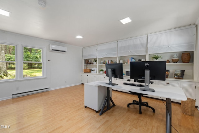 700 Tinkerbell Rd, Chapel Hill, NC 27517 - home office with a baseboard radiator, a wall mounted AC, and light wood-type flooring