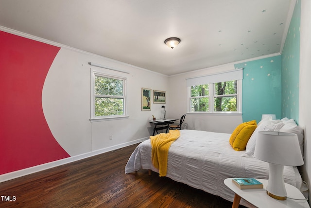 700 Tinkerbell Rd, Chapel Hill, NC 27517 - bedroom with wood finished floors and crown molding