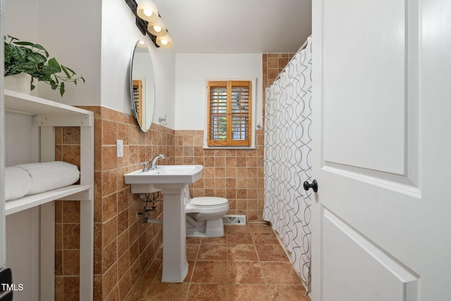 700 Tinkerbell Rd, Chapel Hill, NC 27517 - full bathroom with tile walls and wainscoting