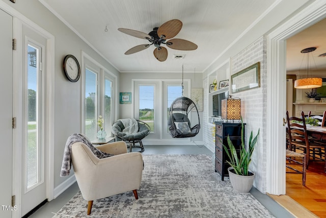 10781 US-158, Reidsville, NC 27320 - sunroom / solarium featuring ornamental molding and wood finished floors