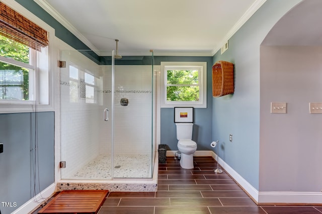 10781 US-158, Reidsville, NC 27320 - bathroom featuring wood tiled floors, a shower stall, and crown molding