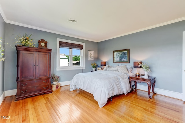 10781 US-158, Reidsville, NC 27320 - bedroom with light wood-style floors and crown molding