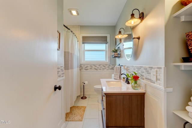 10781 US-158, Reidsville, NC 27320 - bathroom with vanity, tile patterned floors, and a shower with shower curtain