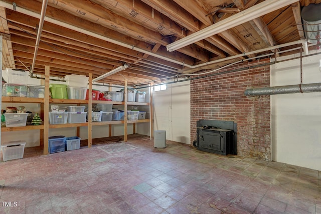 10781 US-158, Reidsville, NC 27320 - unfinished basement featuring a wood stove