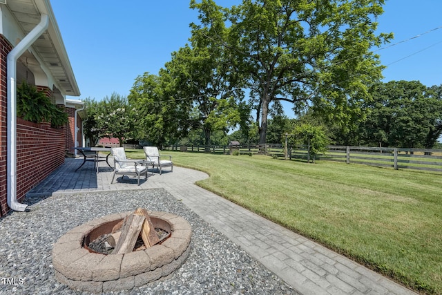 10781 US-158, Reidsville, NC 27320 - fenced backyard featuring a fire pit and a patio