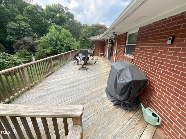 5924 Woodcrest Dr, Raleigh, NC 27603 - wooden deck featuring grilling area