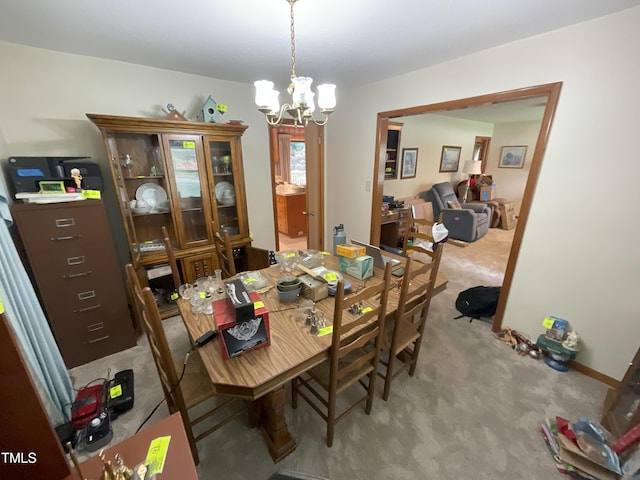 5924 Woodcrest Dr, Raleigh, NC 27603 - dining room with a chandelier and light colored carpet
