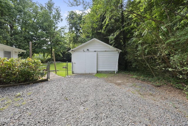 7 Meadowbrook Ave, Durham, NC 27712 - garage with a gate and a shed