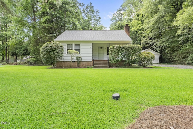 7 Meadowbrook Ave, Durham, NC 27712 - view of front of property with a front yard, a chimney, a porch, and roof with shingles
