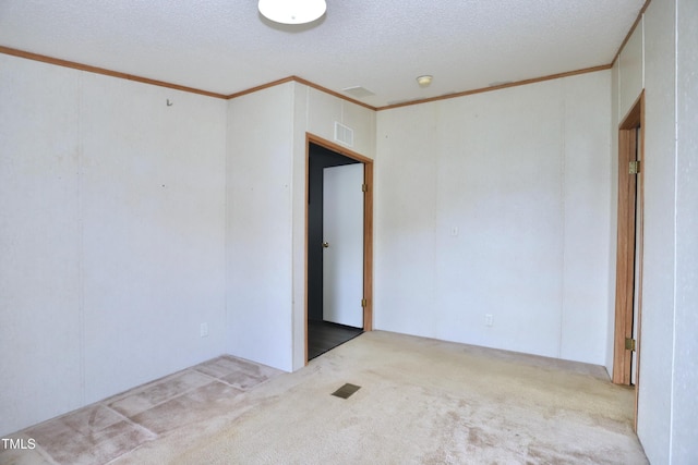 69 Laurel Meadows Ct, Burlington, NC 27217 - empty room with crown molding, carpet flooring, and a textured ceiling