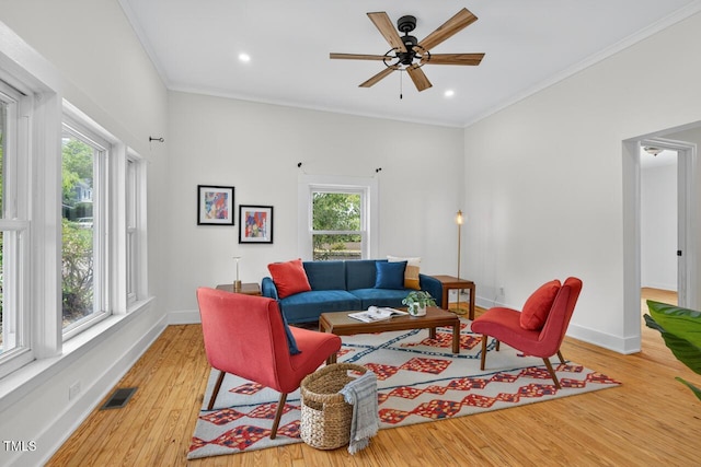 1001 Lancaster St, Durham, NC 27701 - living room featuring crown molding, light wood-style floors, a ceiling fan, and recessed lighting