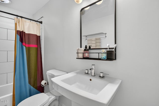1001 Lancaster St, Durham, NC 27701 - full bathroom featuring toilet and shower / bath combo with shower curtain