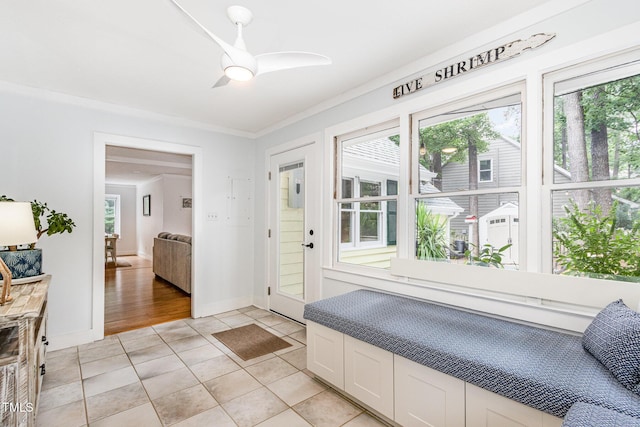 6025 Tarnhour Ct, Raleigh, NC 27612 - foyer featuring light tile patterned flooring, ceiling fan, and crown molding