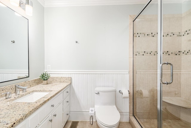 6025 Tarnhour Ct, Raleigh, NC 27612 - full bath with vanity, a wainscoted wall, a shower stall, and ornamental molding