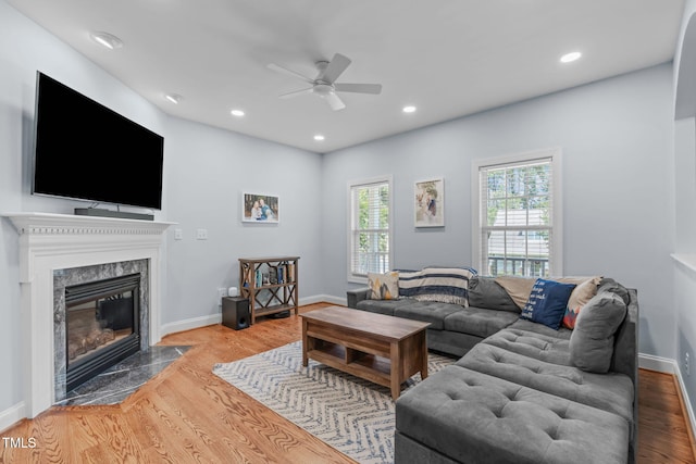 511 Scotts Ridge Trl, Apex, NC 27502 - living room featuring ceiling fan, a fireplace, wood finished floors, and recessed lighting