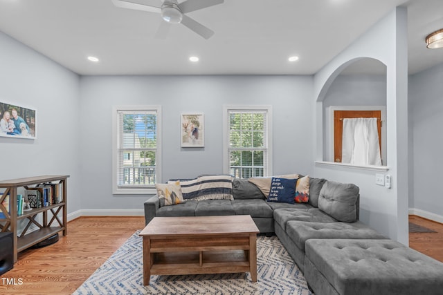511 Scotts Ridge Trl, Apex, NC 27502 - living room featuring ceiling fan, wood finished floors, recessed lighting, and arched walkways