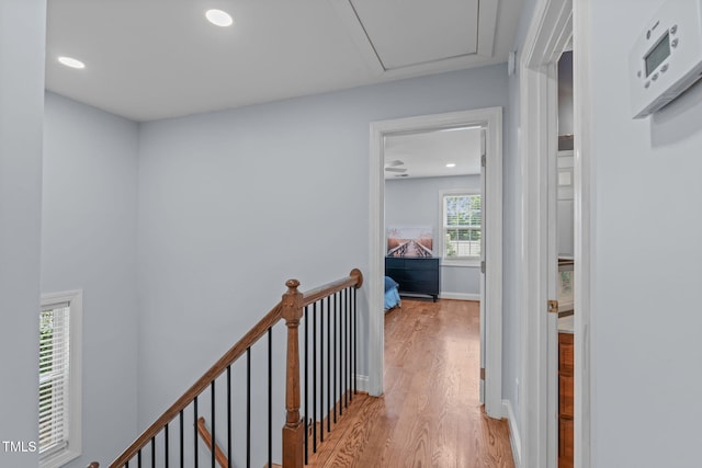 511 Scotts Ridge Trl, Apex, NC 27502 - corridor with light wood-type flooring, an upstairs landing, and recessed lighting