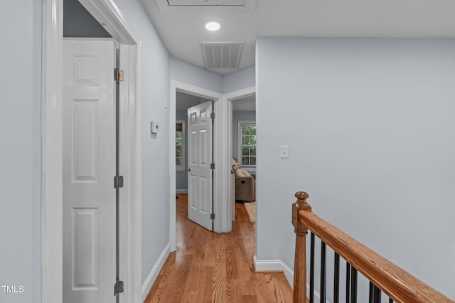 511 Scotts Ridge Trl, Apex, NC 27502 - corridor featuring light wood-type flooring and an upstairs landing