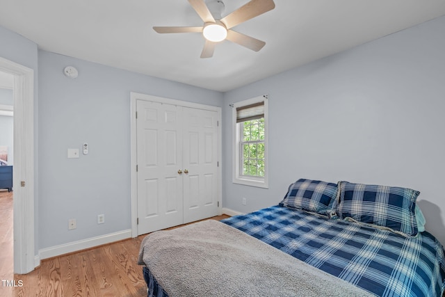 511 Scotts Ridge Trl, Apex, NC 27502 - bedroom featuring wood finished floors, a closet, and ceiling fan