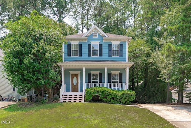 511 Scotts Ridge Trl, Apex, NC 27502 - view of front facade featuring a porch and a front yard