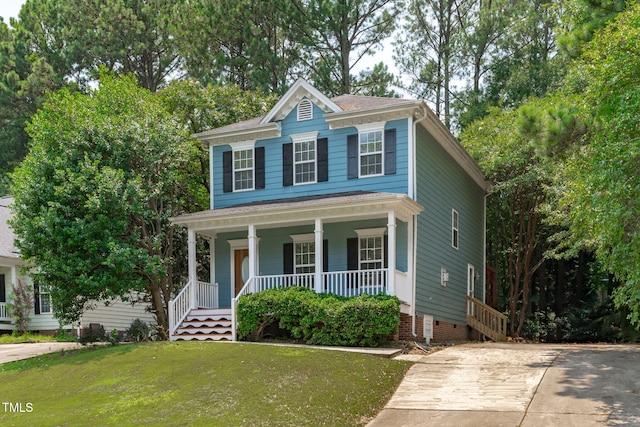 511 Scotts Ridge Trl, Apex, NC 27502 - view of front of home with covered porch and a front lawn