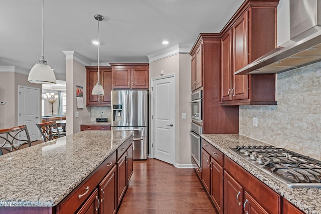 1950 Firenza Dr, Apex, NC 27502 - kitchen with stainless steel appliances, wall chimney range hood, ornamental molding, light stone counters, and a kitchen island