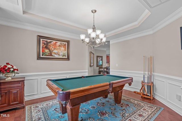 1950 Firenza Dr, Apex, NC 27502 - recreation room with a chandelier, ornamental molding, pool table, a raised ceiling, and wainscoting