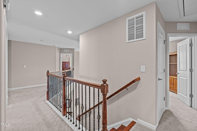 1950 Firenza Dr, Apex, NC 27502 - hallway with an upstairs landing, carpet flooring, attic access, and recessed lighting