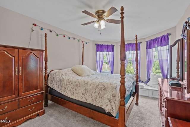 1950 Firenza Dr, Apex, NC 27502 - bedroom with light colored carpet, multiple windows, and ceiling fan