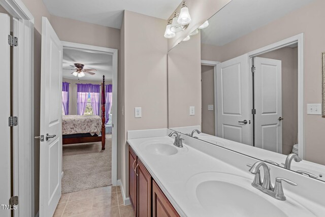 1950 Firenza Dr, Apex, NC 27502 - bathroom featuring ensuite bathroom, double vanity, ceiling fan, and tile patterned floors