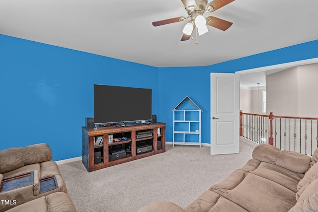 1950 Firenza Dr, Apex, NC 27502 - carpeted living area featuring a ceiling fan and baseboards