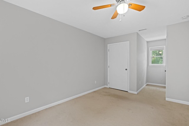3104 Braywood Ct, Apex, NC 27539 - unfurnished bedroom with light carpet and ceiling fan