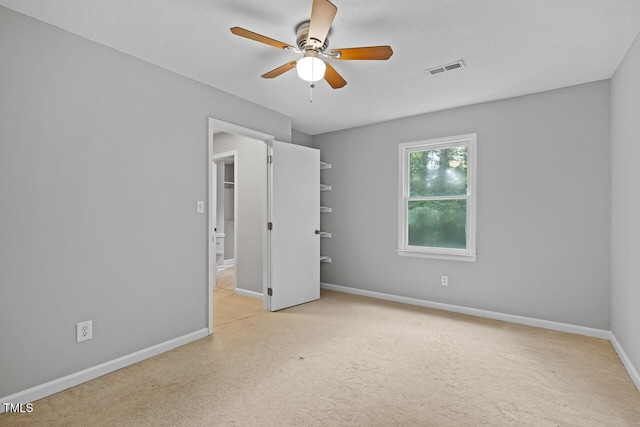 3104 Braywood Ct, Apex, NC 27539 - unfurnished bedroom featuring carpet flooring and ceiling fan