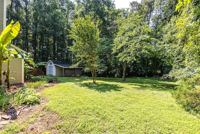 3104 Braywood Ct, Apex, NC 27539 - view of grassy yard featuring a storage unit