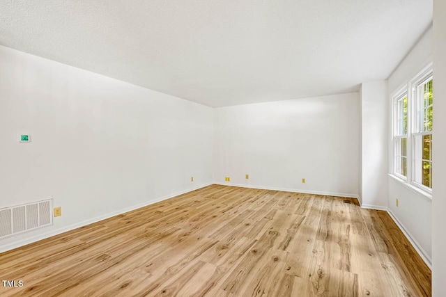 2330 Thunder Rd, Durham, NC 27712 - empty room featuring light wood-style floors and baseboards