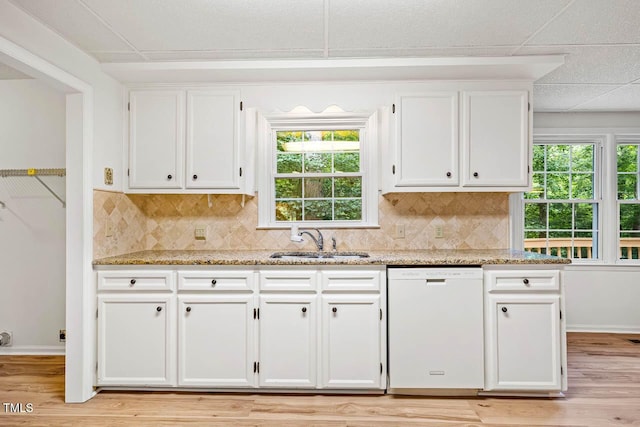 2330 Thunder Rd, Durham, NC 27712 - kitchen featuring dishwasher, white cabinetry, light stone counters, and decorative backsplash