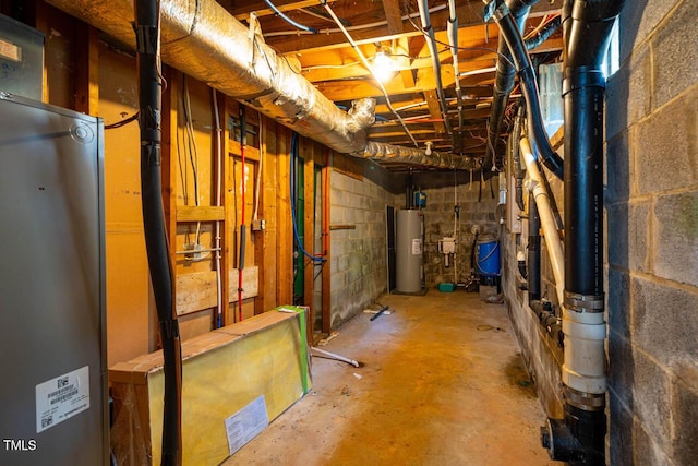 2330 Thunder Rd, Durham, NC 27712 - unfinished basement with gas water heater, water heater, concrete block wall, and a water pressure tank