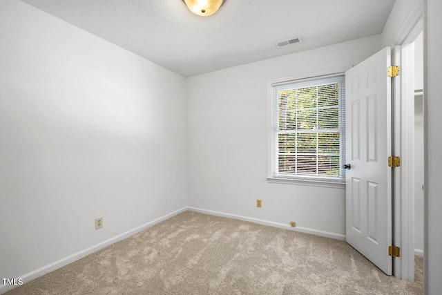 2330 Thunder Rd, Durham, NC 27712 - unfurnished room featuring carpet flooring and a textured ceiling