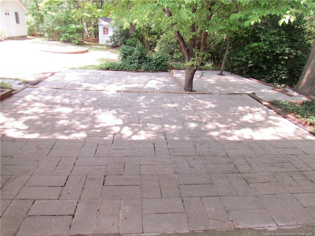 310 N Farmers Rd, Fayetteville, NC 28311 - view of patio with a storage unit