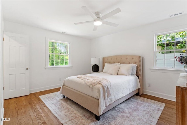 6311 Brandywine Rd, Raleigh, NC 27607 - bedroom with wood finished floors and a ceiling fan