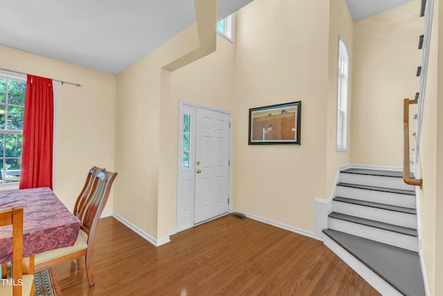 2114 Baycourt Trl, Hillsborough, NC 27278 - entryway featuring wood finished floors and stairway