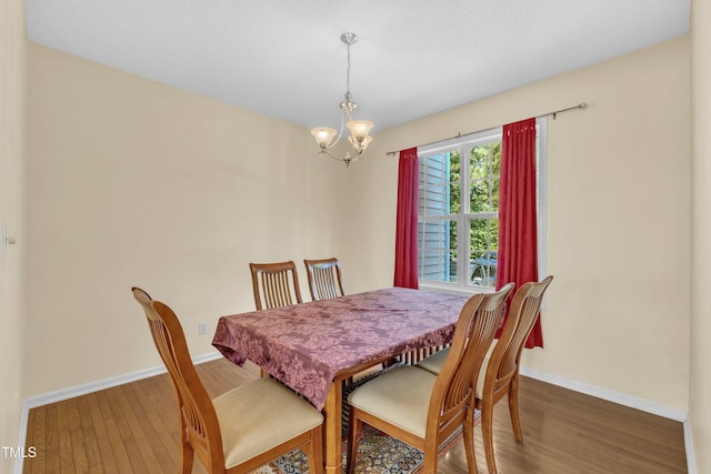 2114 Baycourt Trl, Hillsborough, NC 27278 - dining space with a chandelier and wood finished floors