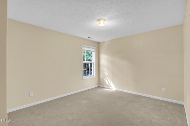 2114 Baycourt Trl, Hillsborough, NC 27278 - carpeted spare room featuring a textured ceiling and baseboards
