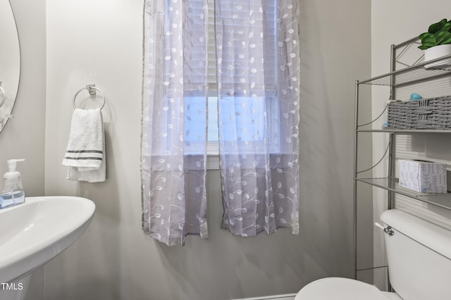 1204 Chapanoke Rd, Raleigh, NC 27603 - bathroom with toilet and a sink