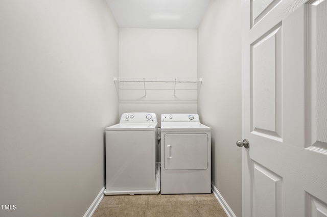 1204 Chapanoke Rd, Raleigh, NC 27603 - laundry room featuring washer and dryer and baseboards