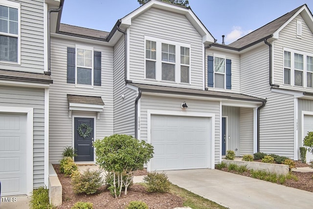 1004 Citadel Ave, Durham, NC 27713 - view of property featuring a garage and concrete driveway