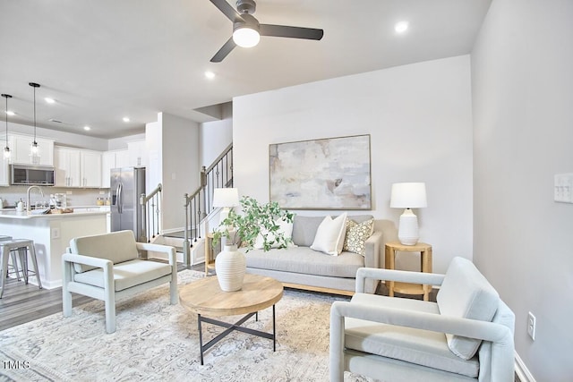 1004 Citadel Ave, Durham, NC 27713 - living room featuring a ceiling fan, stairs, light wood-type flooring, and recessed lighting