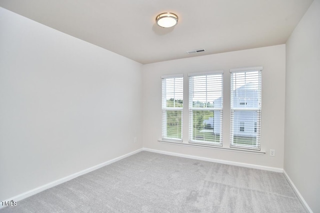 1004 Citadel Ave, Durham, NC 27713 - carpeted spare room with baseboards